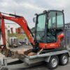 2015 Kubota KX019-4 mit Anbaugeräten und Anhänger