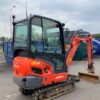 2015 Kubota KX019-4 mit Anbaugeräten und Anhänger