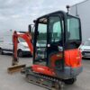 2015 Kubota KX019-4 mit Anbaugeräten und Anhänger