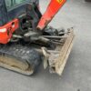 2015 Kubota KX019-4 mit Anbaugeräten und Anhänger