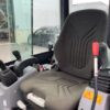 2015 Kubota KX019-4 mit Anbaugeräten und Anhänger